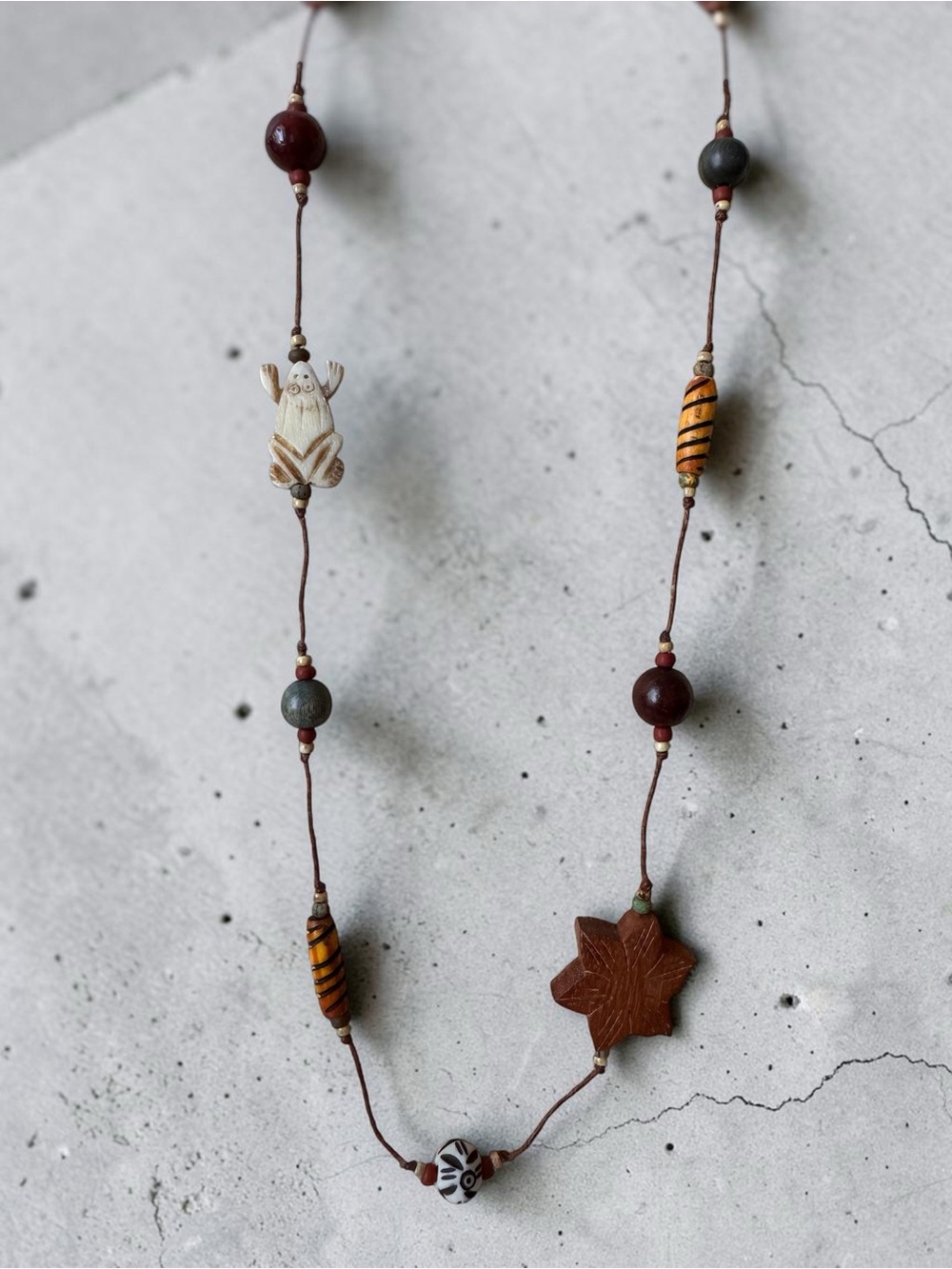 Handcrafted Carved Bead Necklace - Women's Jewelry